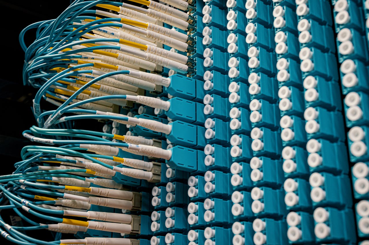 gallery-6 From below of fiber optic equipment with similar colorful rubber cables and round sockets