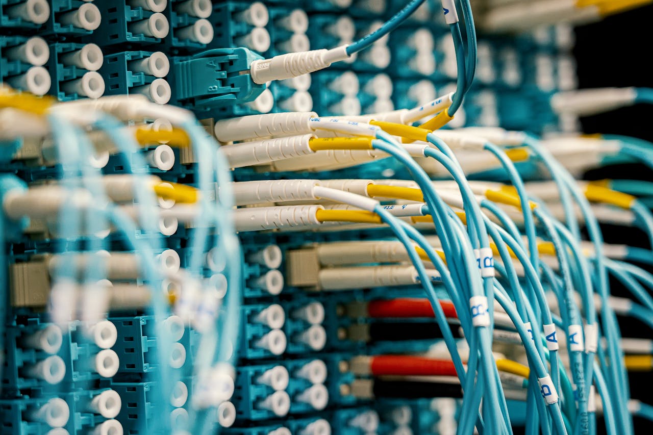 gallery-3 Industrial optical switch with connected rubber cables of different colors with stickers representing letters and numbers and plastic terminations